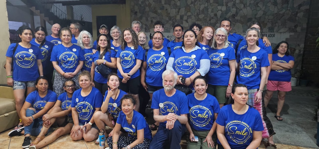 2025 team posed group shot of 40 volunteers in team shirts