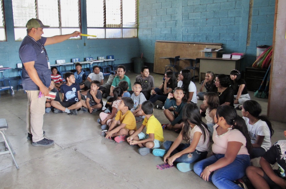 class-ed schoolroom with dental stations, patients and providers