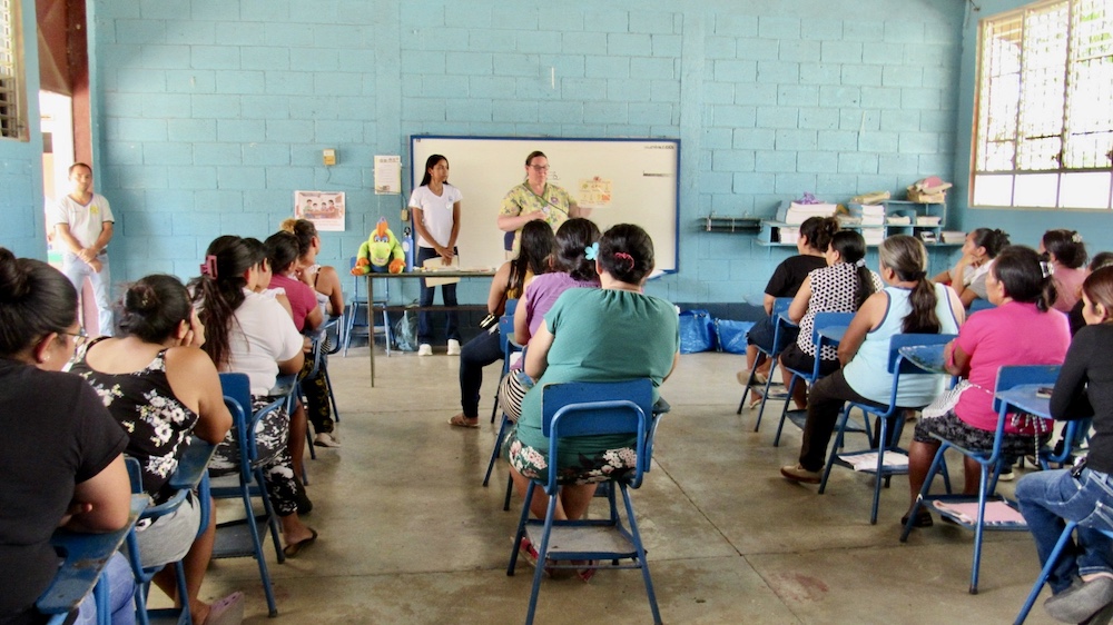 parent-ed holds capped labelled brush for each child